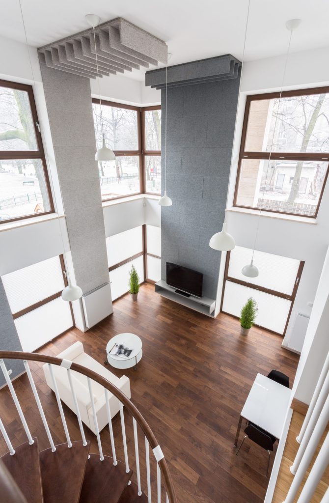 View of spacious living room from the stairs