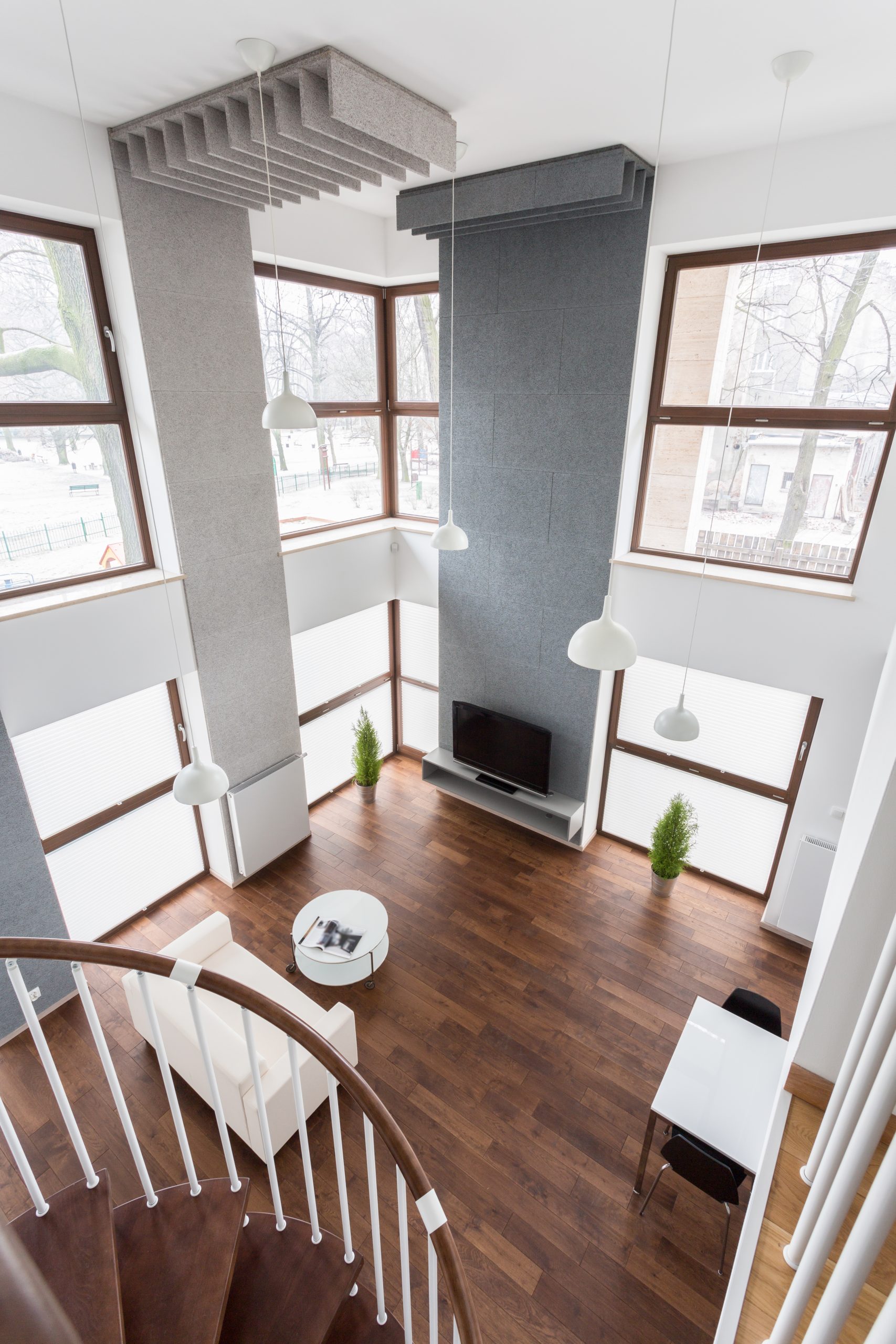 View of spacious living room from the stairs